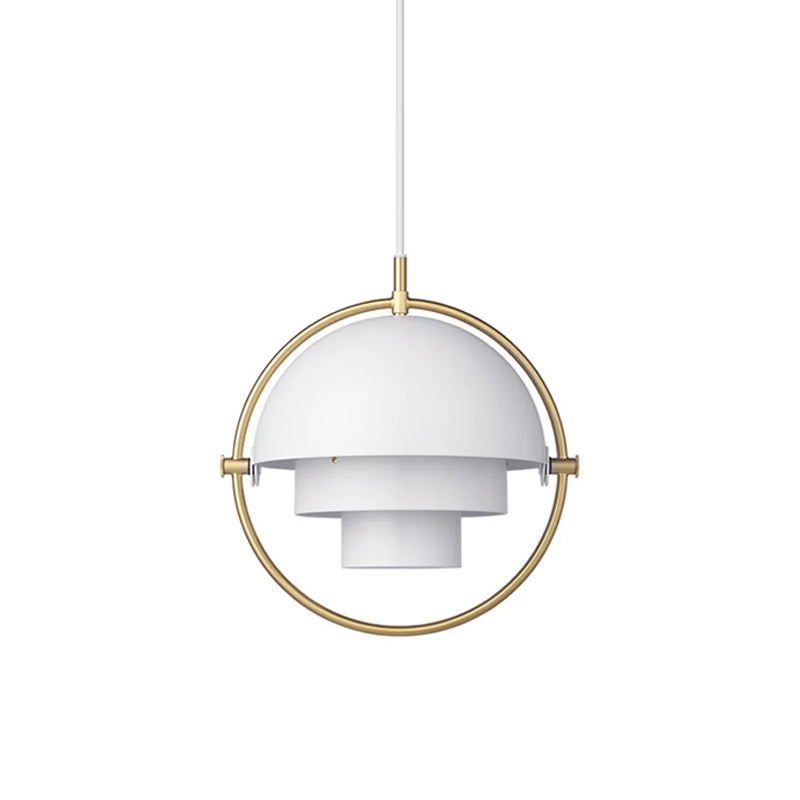 White Clérachic pendant with a gold ring and a white cord, on a plain white backdrop.