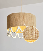 A close-up circle highlights the woven hemp rope texture on this Clérachic pendant's shade, lit from within.