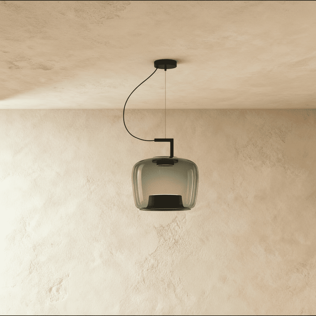 Clérachic mid-size smoky grey glass pendant with a black inner cone, unlit, on a black curved cord and arm.