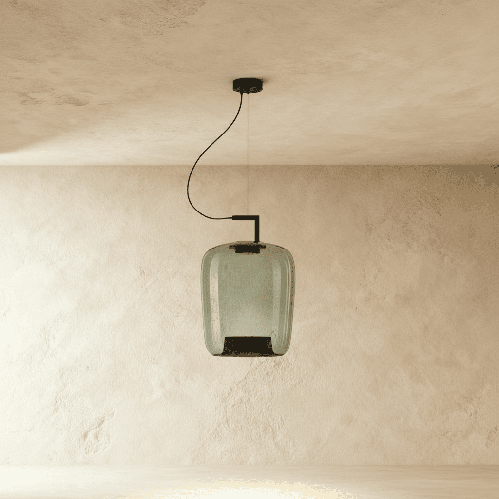 Clérachic tall green glass pendant with a black inner cone, unlit, hanging from a black curved cord and arm.