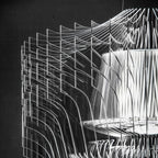 Black-and-white close view of the stacked clear fins and tiered inner shade on a Clérachic acrylic pendant.
