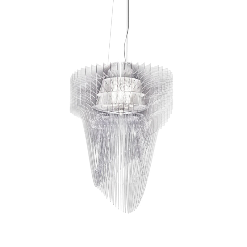 A Clérachic clear acrylic fringe pendant on white, seen from slightly below with its fins falling in long, fine strands.