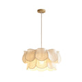 Studio view of this Clérachic pendant, showing its wood canopy, twisted cord and layered linen petals.