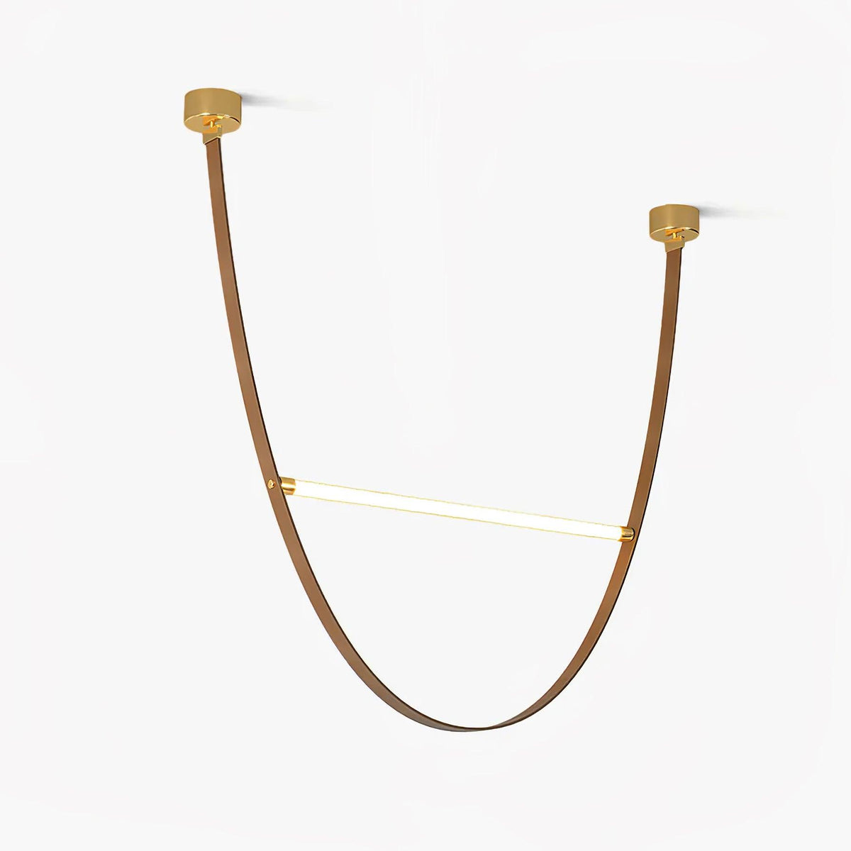 Two brass canopy plates and a single curved leather strap loop holding one glowing LED bar, on this Clérachic pendant against a white backdrop.