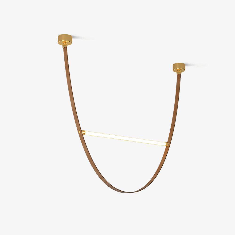 Single curved tan leather loop with a brass-capped light bar and two canopy plates, shown on this Clérachic pendant on white.