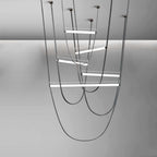 A grey-toned five-bar render of this Clérachic pendant, with narrow loops and dark canopy plates on a plain backdrop.