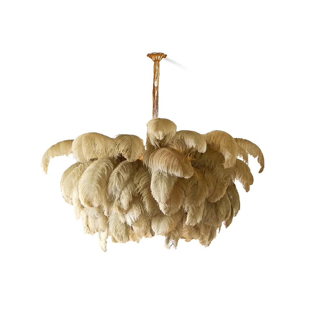Front view of a Clérachic chandelier with natural ostrich feathers fanning out below a thin carved brass stem, on white.