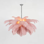 Pale pink plumes glow warmly around the core of this Clérachic chandelier, with a silver-finish stem above.