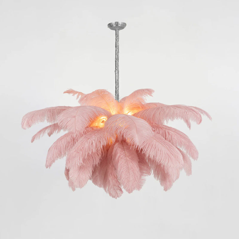 Pale pink plumes glow warmly around the core of this Clérachic chandelier, with a silver-finish stem above.