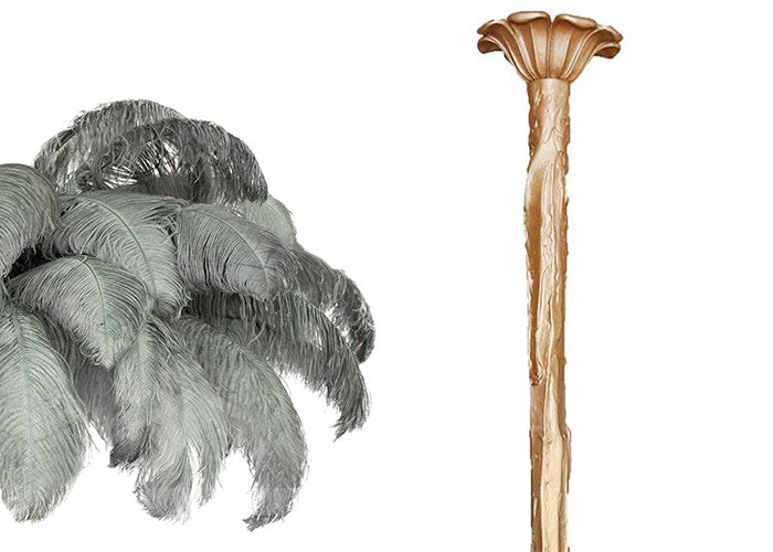 Swatch of sage-grey ostrich feathers beside the brass-finish stem and ceiling cup of this Clérachic chandelier.