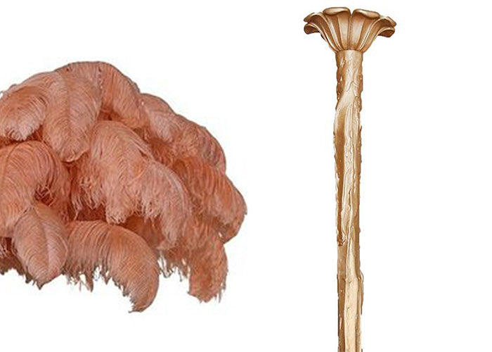 Peach feather sample with the brass-finish carved stem, shown on white for this Clérachic chandelier.