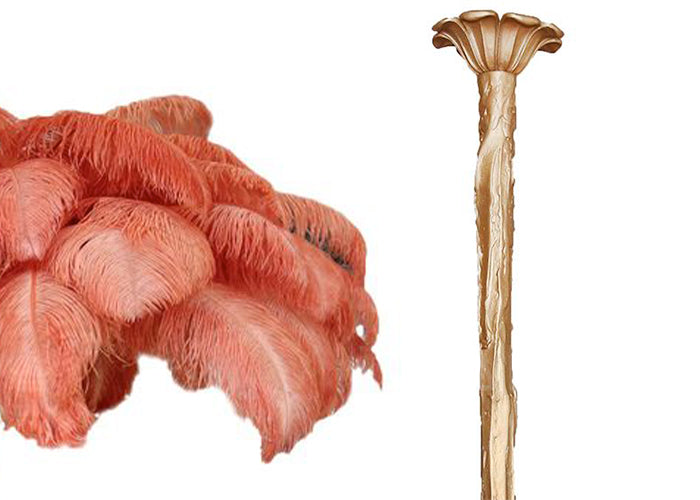 Coral feather sample with the brass-finish carved stem, shown on white for this Clérachic chandelier.