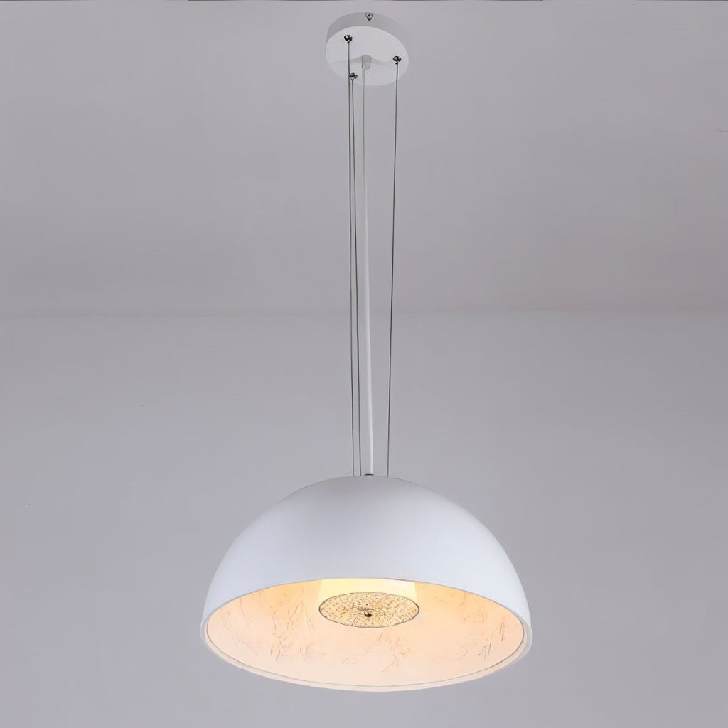 Clérachic white dome pendant light hung from a round ceiling plate on fine wires, lit warm on a grey background.