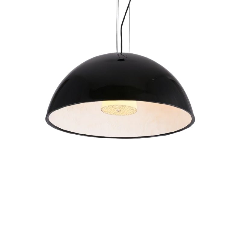 Clérachic glossy black dome pendant light on white, with a cream interior and a frosted glass centre diffuser.