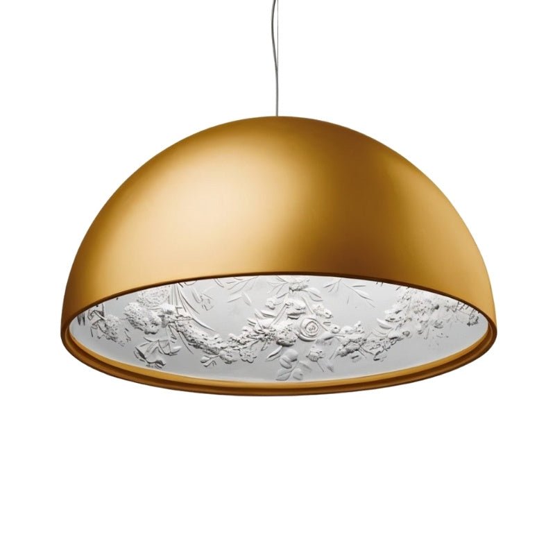 Clérachic matte gold dome pendant light on white, its white interior moulded with a floral garland relief.