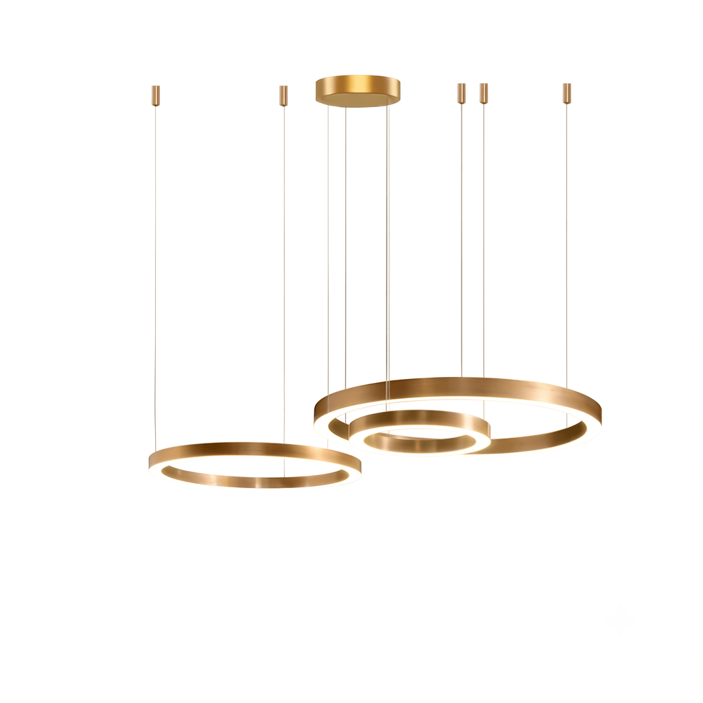 Three brushed gold rings hang from a round ceiling plate on fine cables against white, in this Clérachic ring pendant.