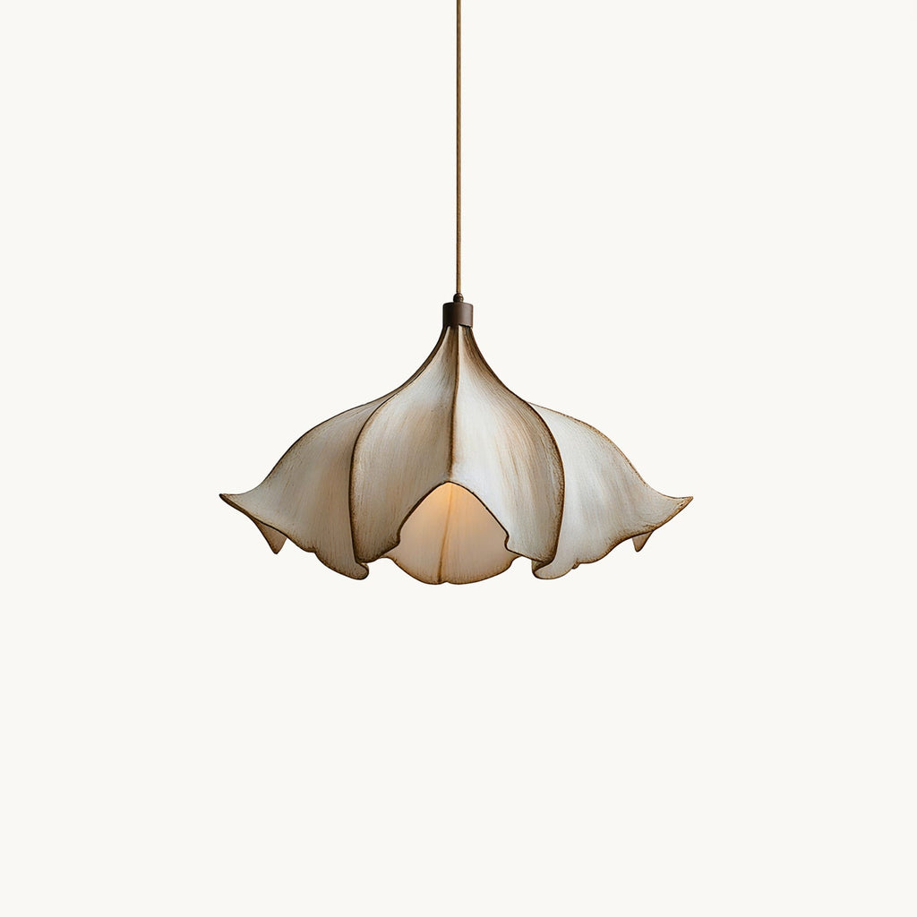 Clérachic pendant light on a white backdrop, with a sculpted petal-shaped shade in cream and brown and a slim brown cord.