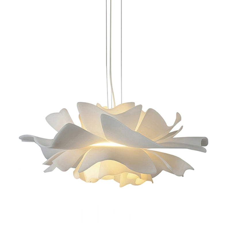 Clérachic white petal pendant lit from within, shown straight on against a white backdrop.