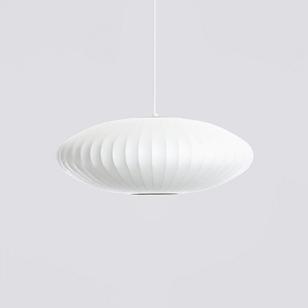 Against a grey backdrop, a broad, flat Clérachic pendant in white shows pale vertical ribs and a rounded rim.