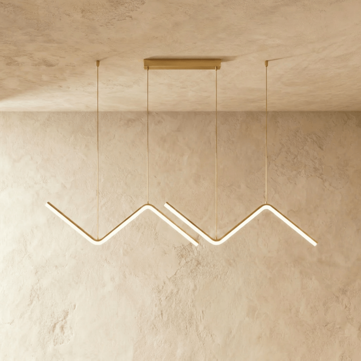 Clérachic gold double zig-zag LED pendant, two glowing bars on slim gold cables from a rectangular canopy.