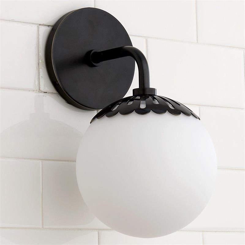Single-head Clérachic Petal-Cap Opal Globe Wall Sconce in oil-rubbed black against white square tile.