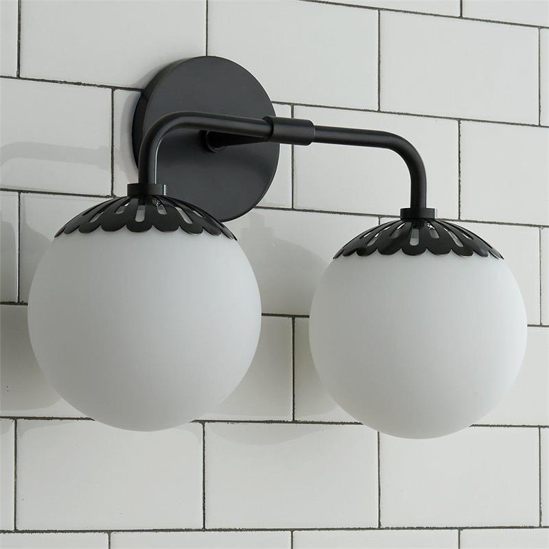Clérachic Petal-Cap Opal Globe Wall Sconce in black with two heads, both opal globes unlit on white tile.