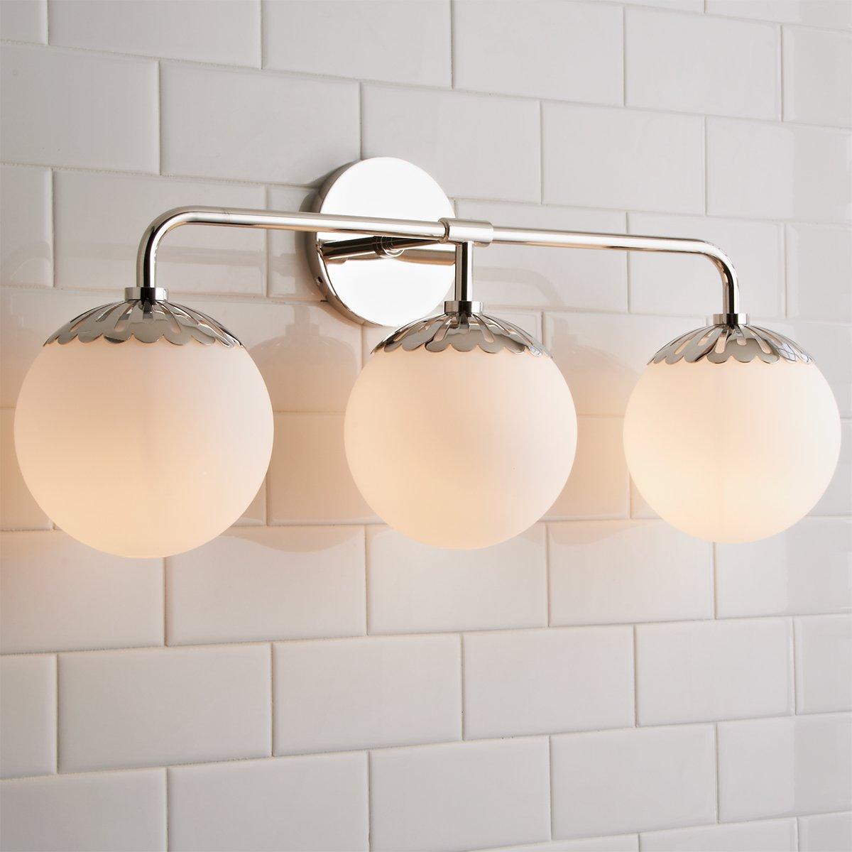 Three-head nickel Clérachic Petal-Cap Opal Globe Wall Sconce turned slightly, globes stepping across the wall.