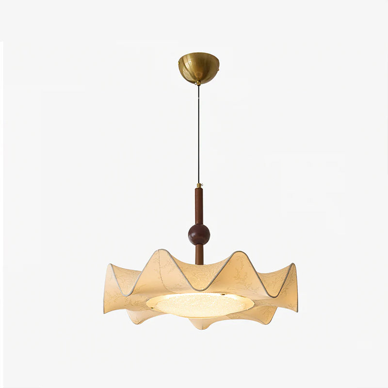Full view of this Clérachic pendant on a pale backdrop, showing its gold ceiling canopy, thin cord, walnut stem and wavy fabric shade.