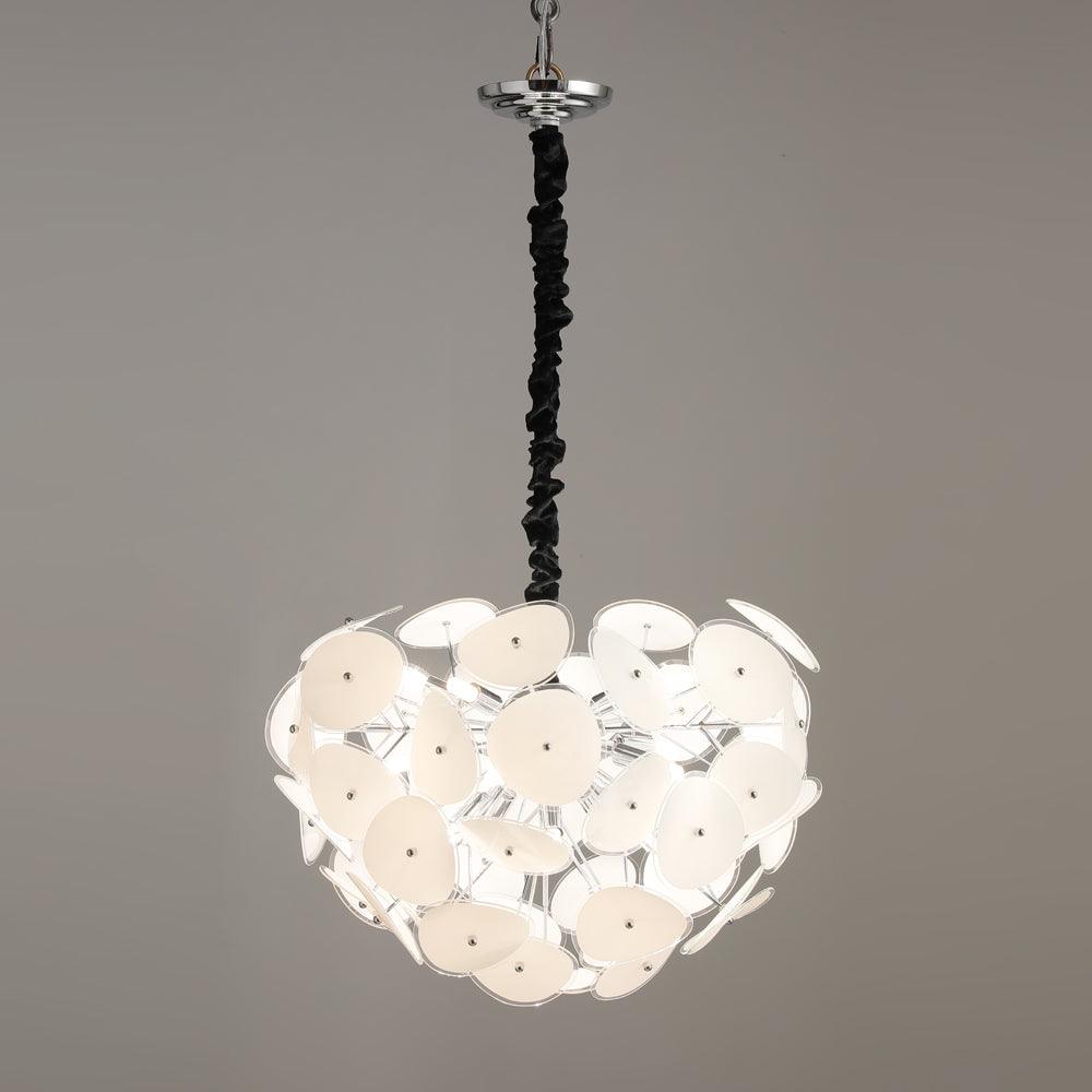 The Clérachic Petal Sphere Chandelier's full dome of frosted glass petals, unlit, hanging from its ruched black cord.