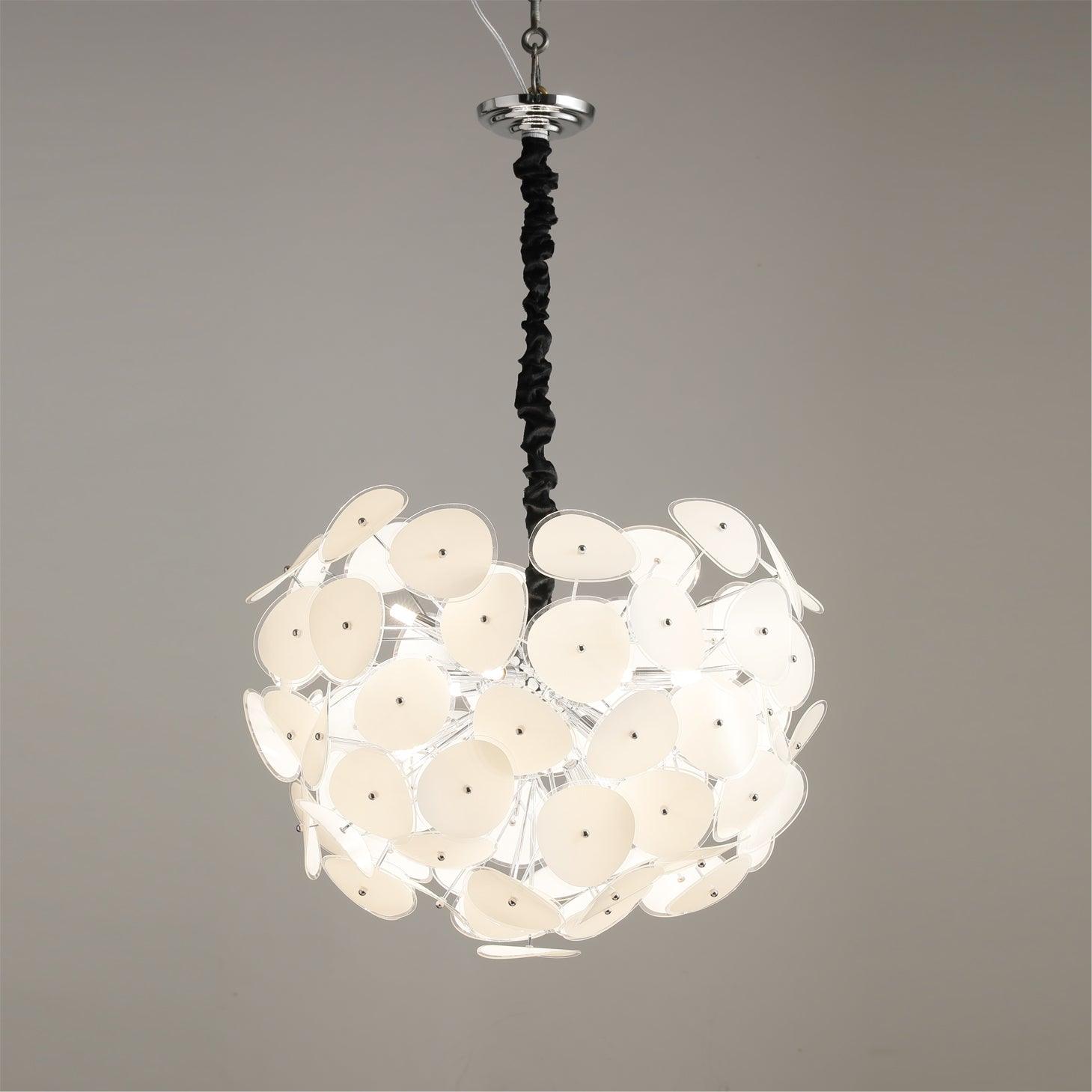 Close-up of the Clérachic Petal Sphere Chandelier's glass petals, each rimmed in polished clear edging.
