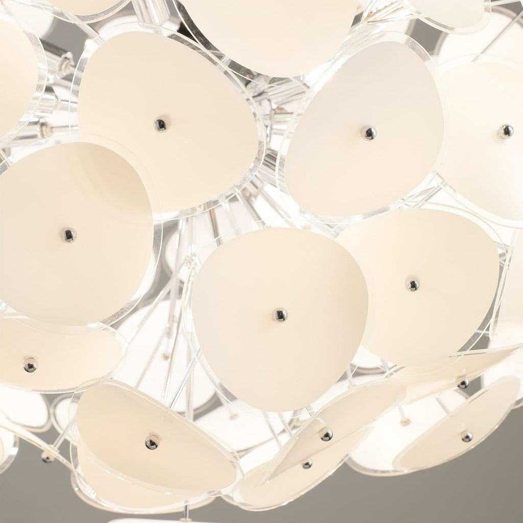 Detail shot of the Clérachic Petal Sphere Chandelier showing individual petals pinned to chrome rods.