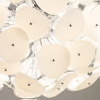 Detail shot of the Clérachic Petal Sphere Chandelier showing individual petals pinned to chrome rods.