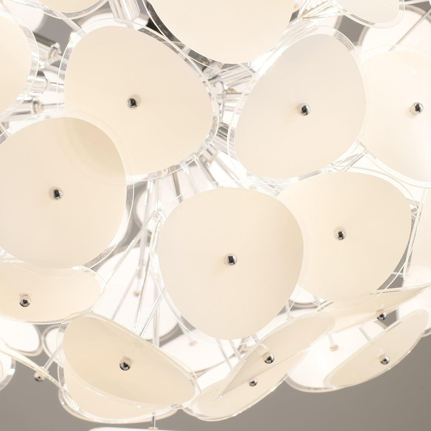 Detail shot of the Clérachic Petal Sphere Chandelier showing individual petals pinned to chrome rods.