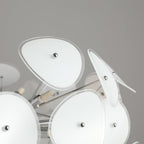 Detail view of the Clérachic Petal Sphere Chandelier's overlapping petals and their chrome ball finials.