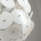Macro shot of the G9 LED bulb used in the Clérachic Petal Sphere Chandelier, seated in its chrome socket.