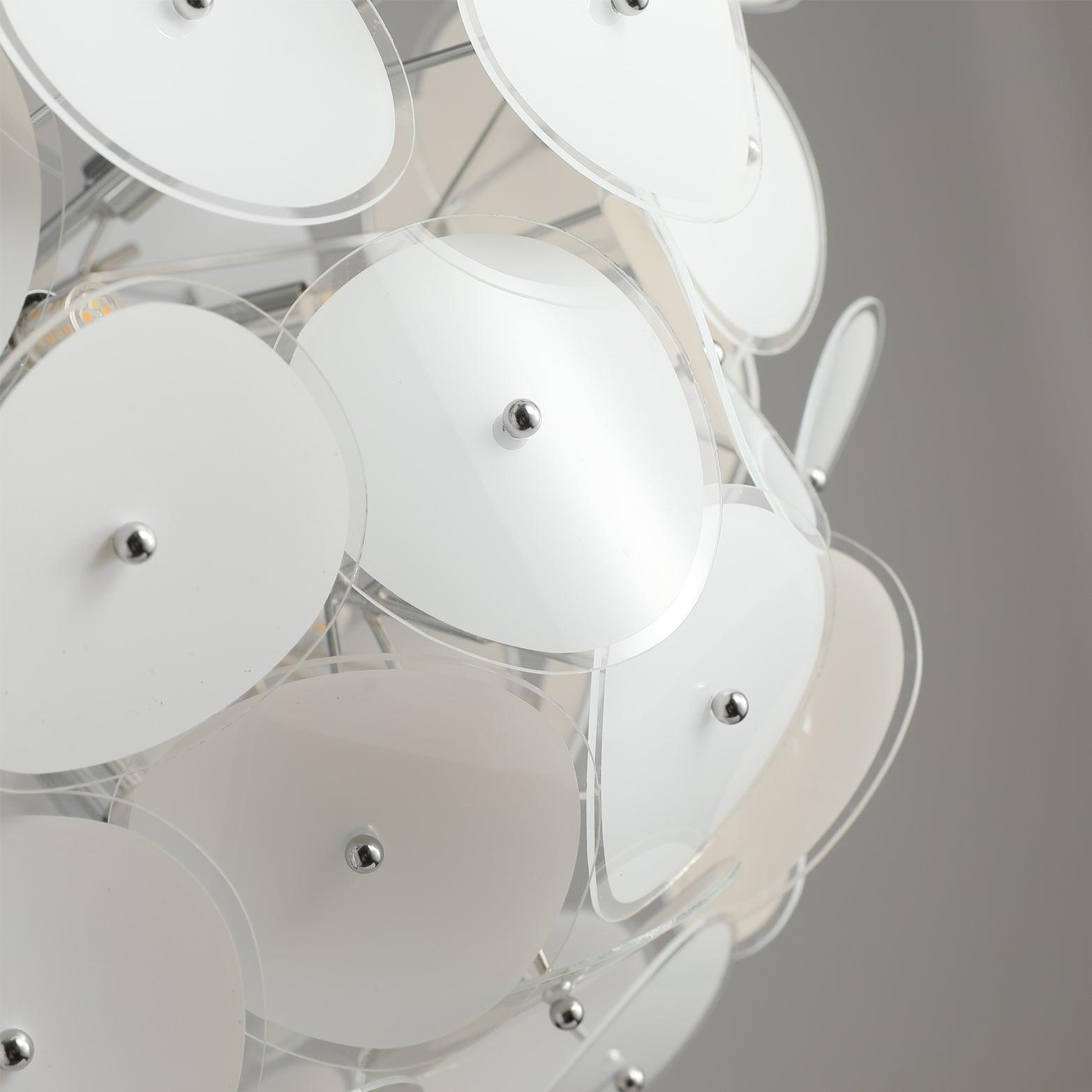 Macro shot of the G9 LED bulb used in the Clérachic Petal Sphere Chandelier, seated in its chrome socket.