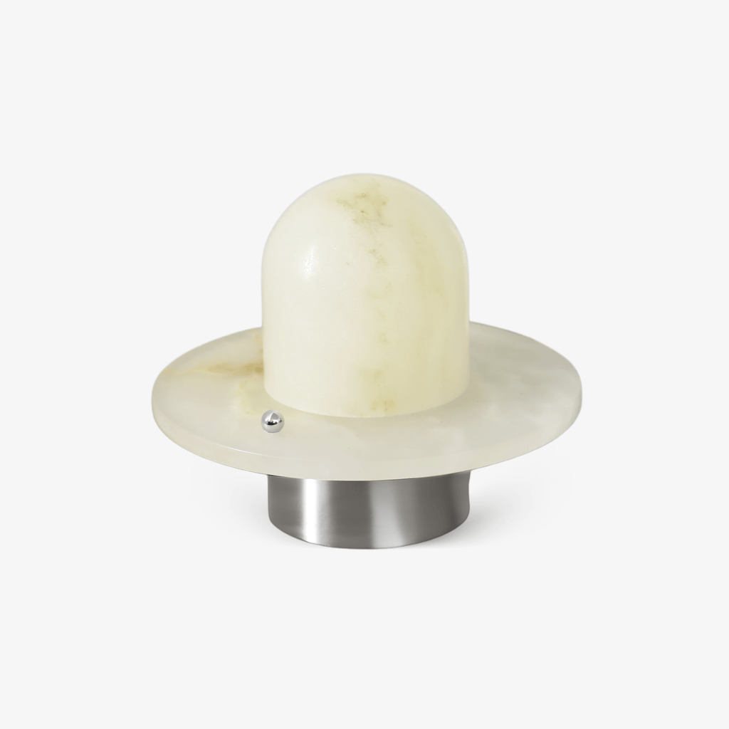 Clérachic Petrified table lamp on white, alabaster dome seated on a stone disc and metal base.