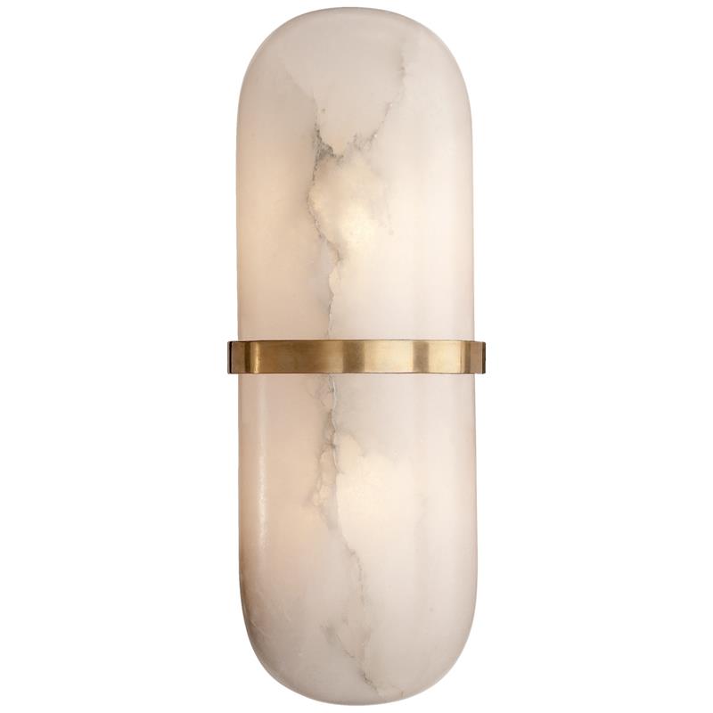 Clérachic Pill-Shaped Wall Sconce in brass, one capsule of chalk-white alabaster split at the waist by a slim brass band.