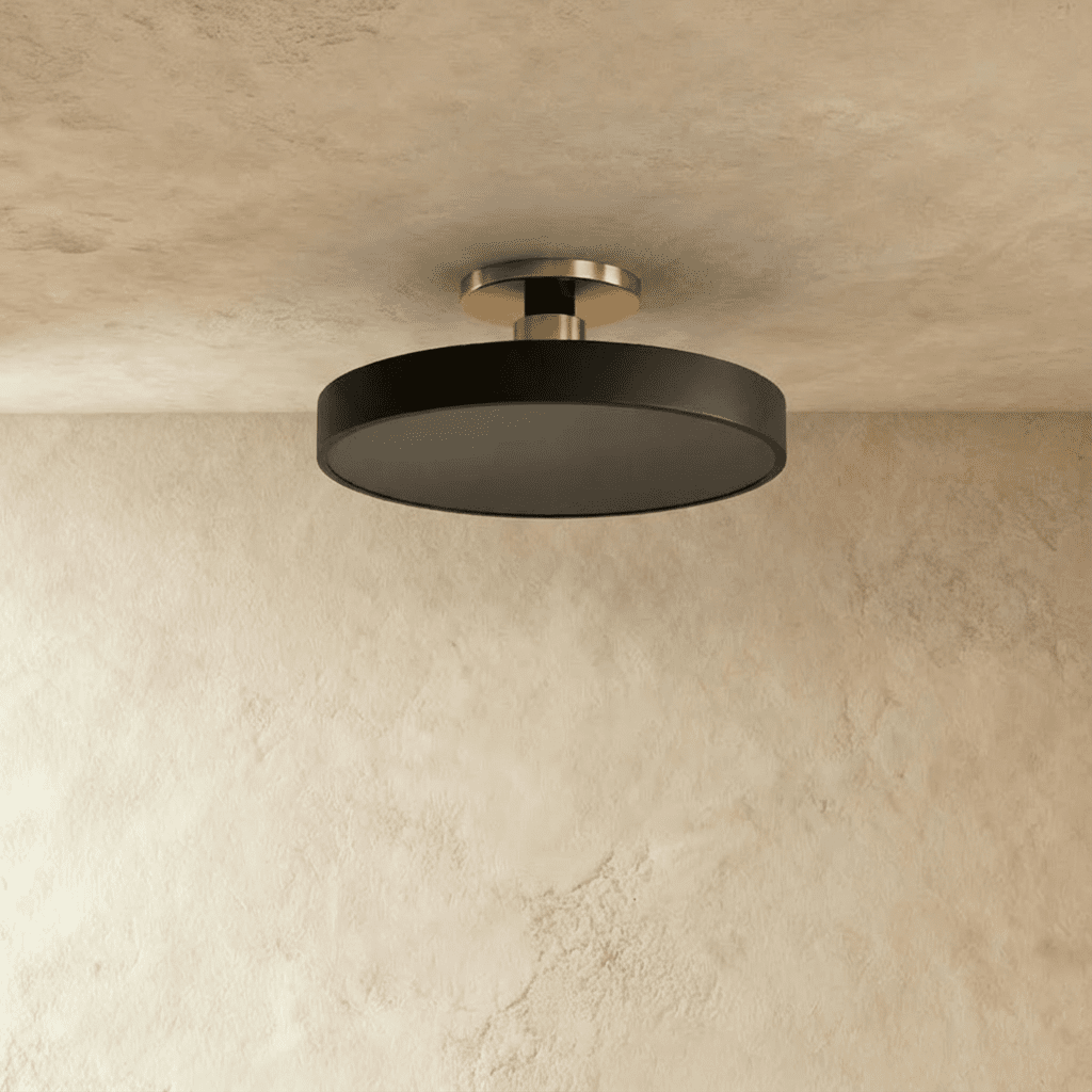 Clérachic ceiling light in matte black with a nickel stem, mounted flush against a plaster ceiling.