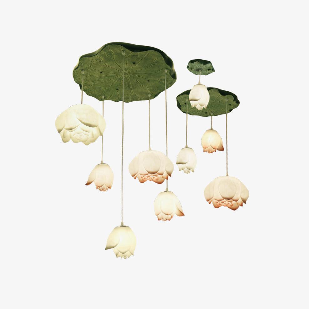 Cut-out view of the Clérachic water-lily pendant cluster on white, with cream and pale peach buds hanging from two lily-pad canopies.