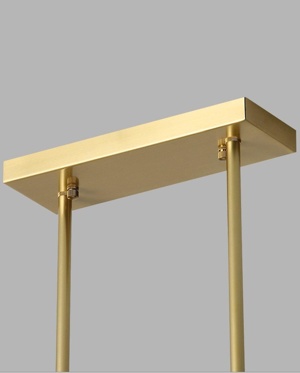 Close view of the rectangular gold ceiling plate and the two rods hanging from it on this Clérachic pendant.