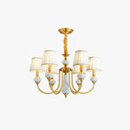 Six-arm version of the Clérachic Pleated Blue Fabric Chandelier, displaying all six pleated shades, brass fittings and the fabric-wrapped hanging rod.