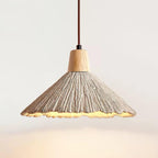Close view of the pleated, ridged texture and the scalloped rim on this Clérachic pendant, with its wooden cap above.