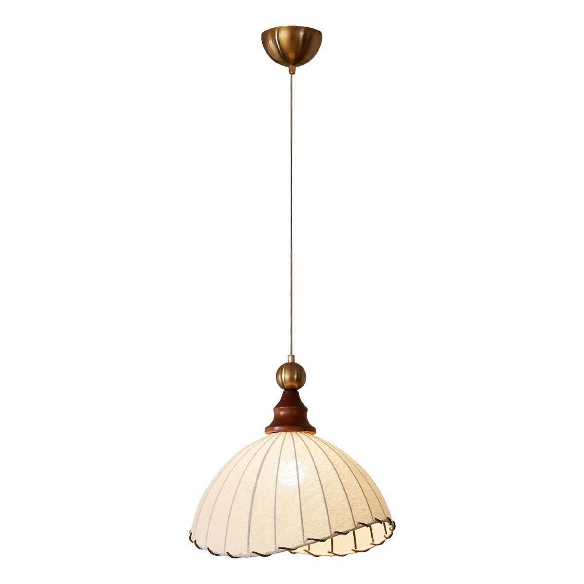 A Clérachic pendant light on a white backdrop, shown with its full cord and brass ceiling canopy above the shade.