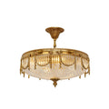 Clérachic brass ceiling light with a pleated clear glass shade, cut out on a plain white background.