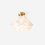 Catalogue view of the Clérachic Pleated Petal Ceiling Light on a plain white ground, warm light glowing through the layered petals.