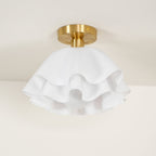 The Clérachic Pleated Petal Ceiling Light unlit, showing the chalk-white matte petals and the scalloped gaps between each layer.