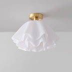 Low-angle studio shot of the Clérachic Pleated Petal Ceiling Light, the ruffled acrylic layers overlapping like a half-open flower.