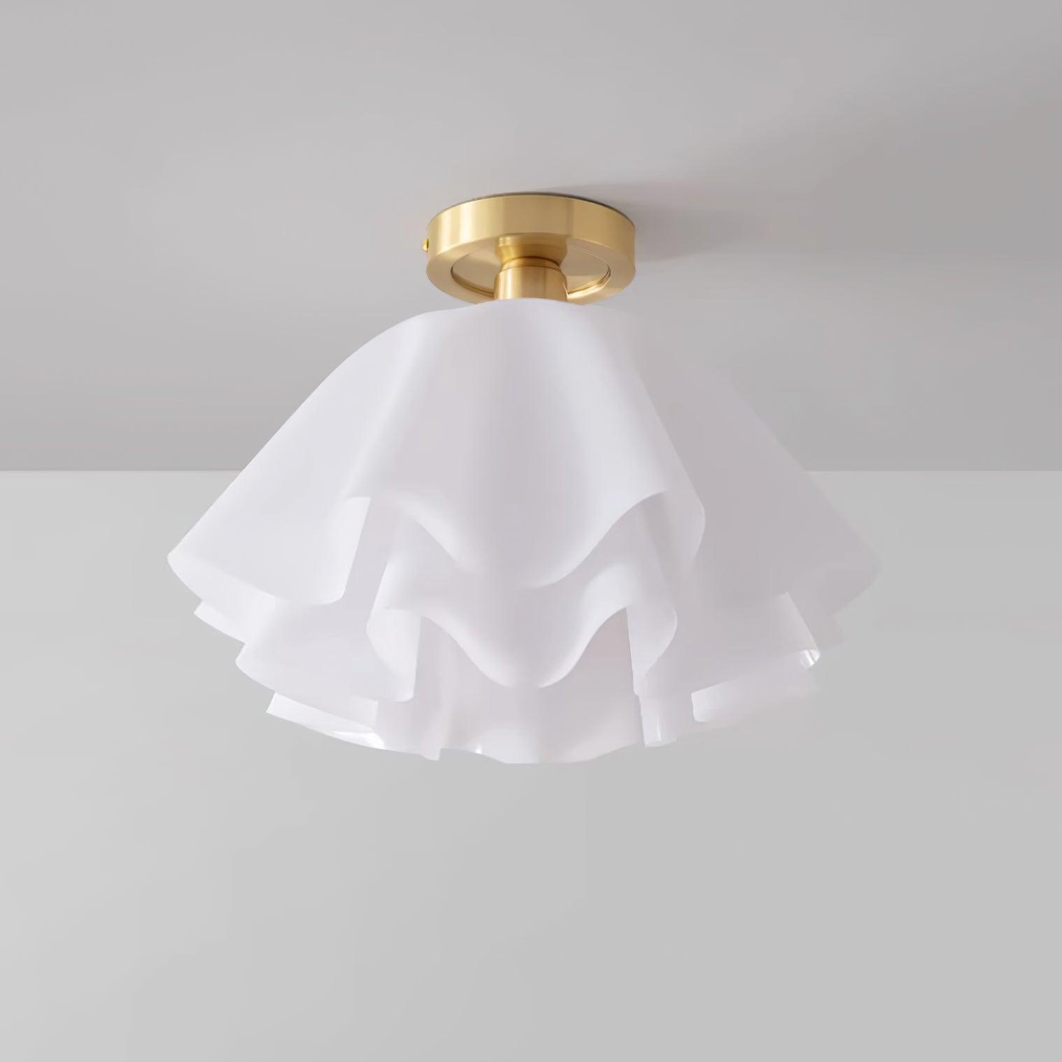Low-angle studio shot of the Clérachic Pleated Petal Ceiling Light, the ruffled acrylic layers overlapping like a half-open flower.