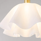 Close-up of the Clérachic Pleated Petal Ceiling Light shade, the cut acrylic edges catching a faint pearl sheen against the brass stem.